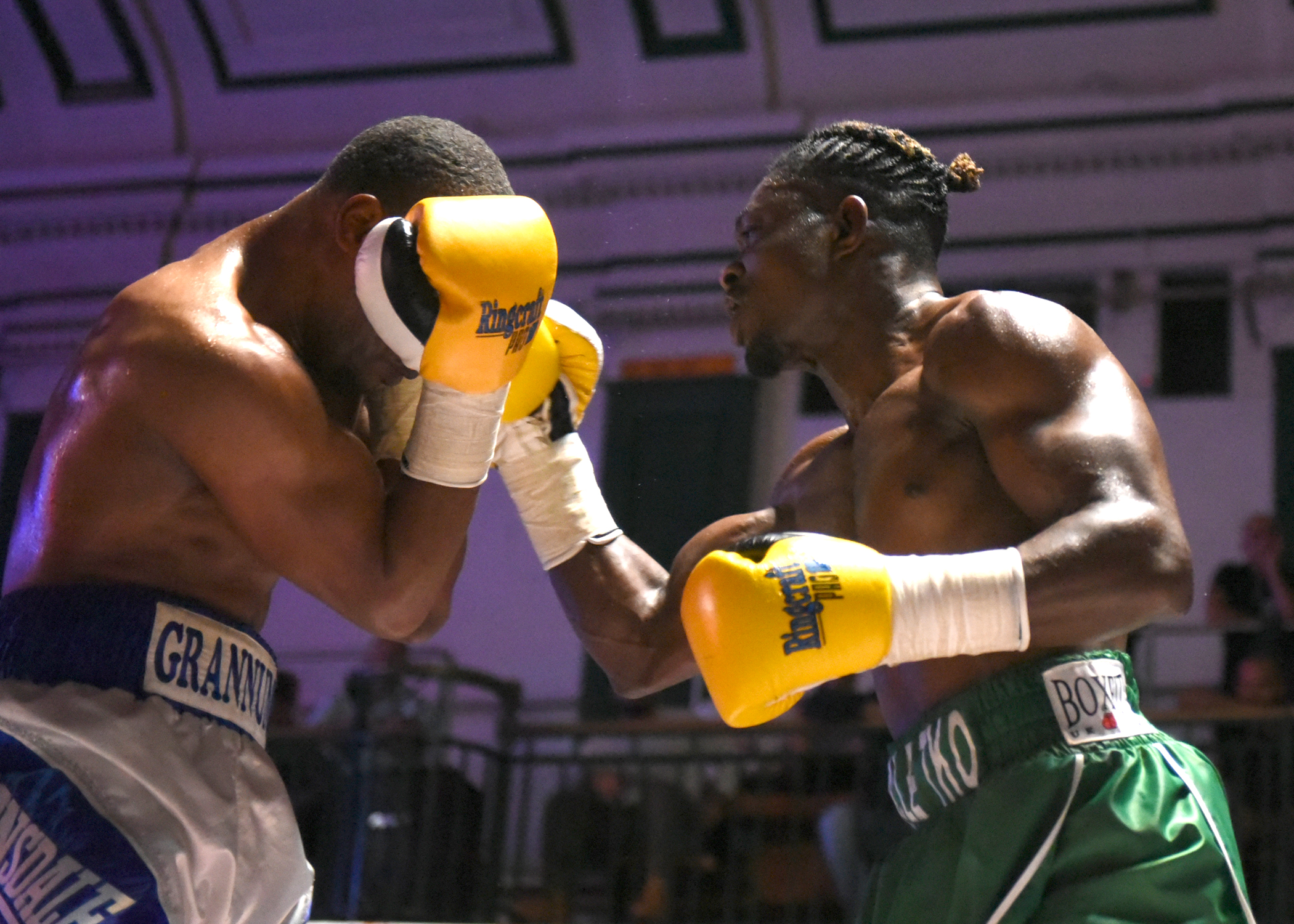 Tunji Ogunniya landing a shot against an opponent